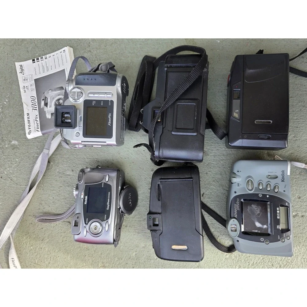 Vintage Camera Lot Canon T70 Fujifilm FinePix 3800 Kodak EasyShare Snappy Z2